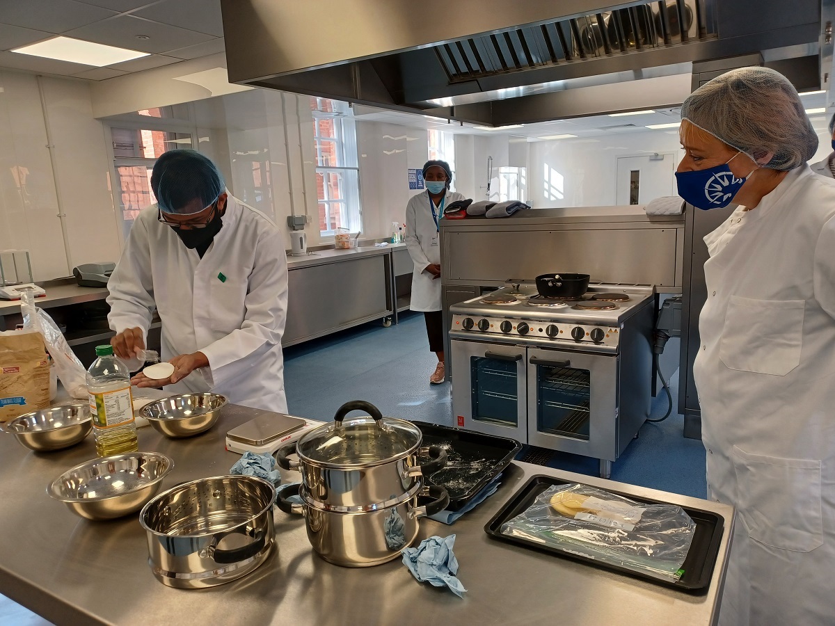 A student demonstrates food product preparation at the opening of the New Product Development facility, part of the Medway Food Innovation Centre - officially opened by Professor Jane Harrington (R), Vice-Chancellor of the University of Greenwich | Photo: G Summers
