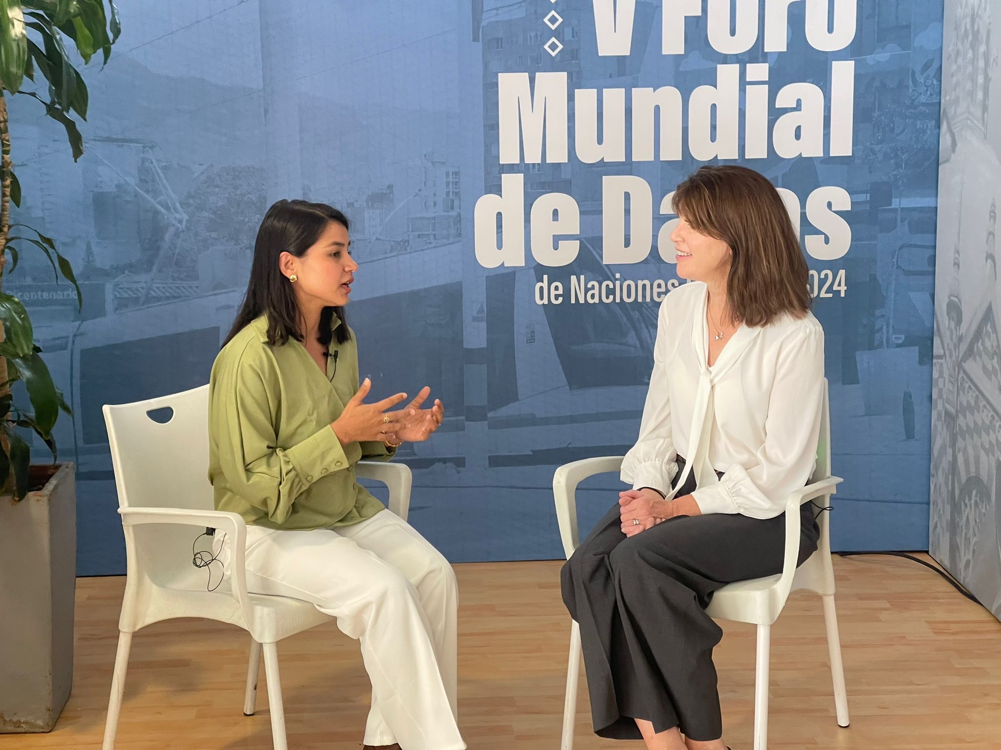 Rubina Adhikari sits next to GPSDD CEO, Claire Melamed during their interview.