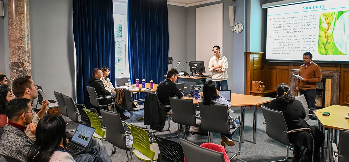 Dr Zhang presented his mycoviral research to a group of people